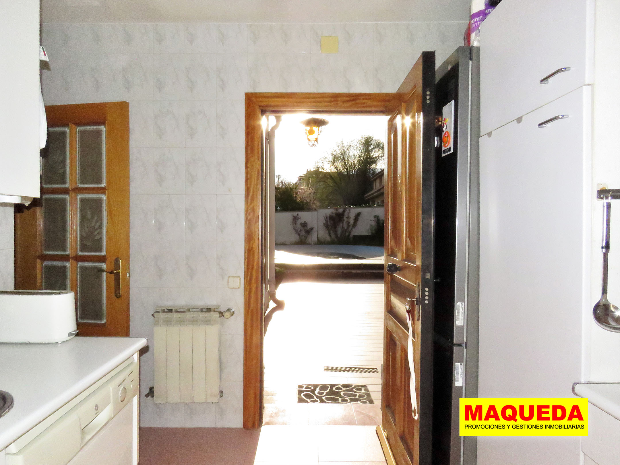 Puerta de acceso al jardín desde la cocina