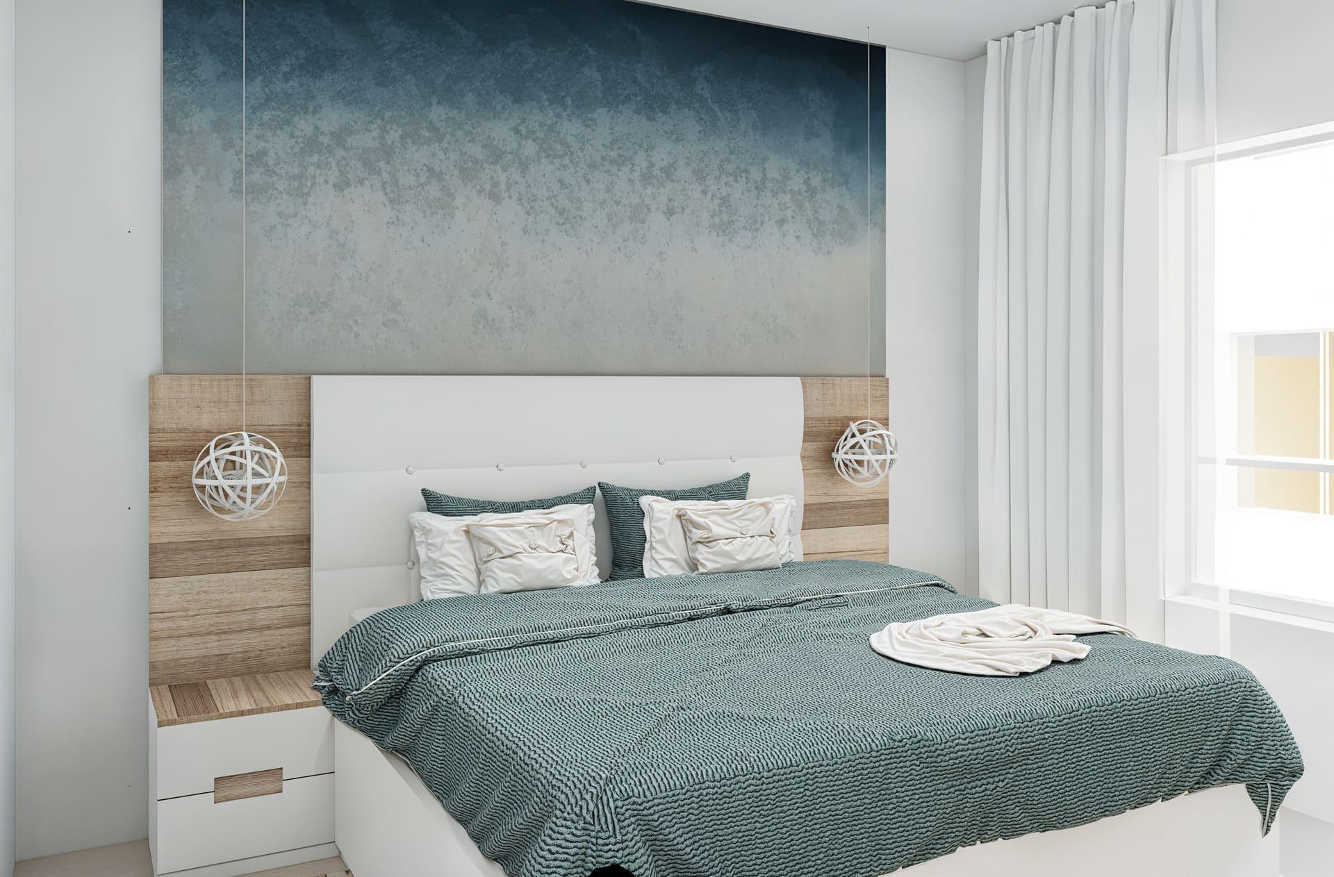 Modern bedroom featuring a white upholstered headboard, teal bedding, and wooden panel accents beside a large window with white curtains