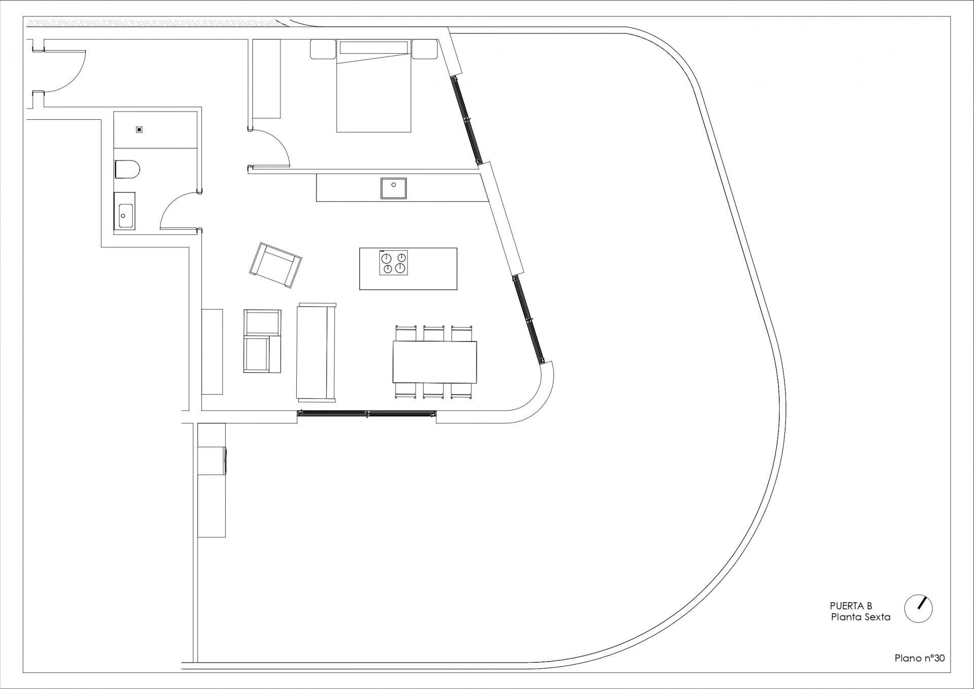 Architectural floor plan of a residential unit: living area with dining table and sofa, kitchen island, bedroom, bathroom, and curved exterior wall on the right.