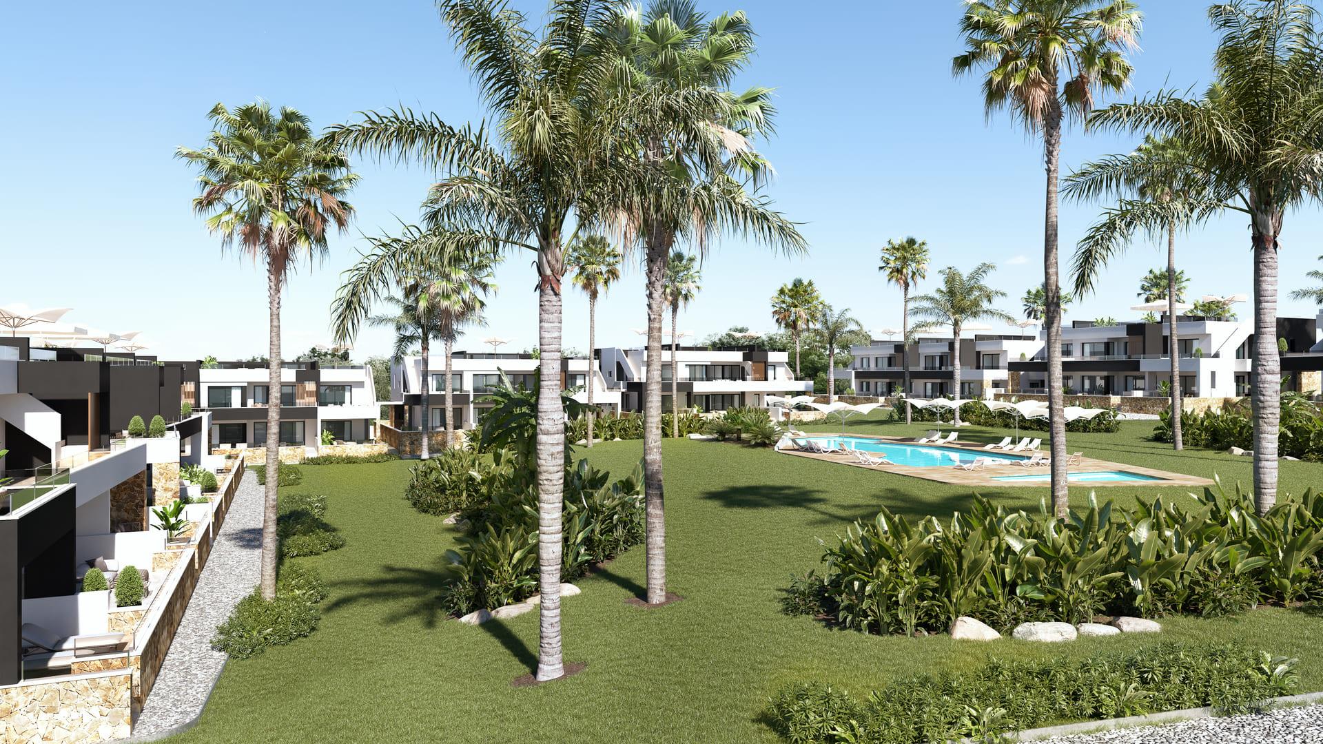 Modern resort-style residential complex with a central pool, white and dark-tone buildings, and palm trees surrounding a green lawn.