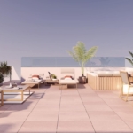 Rooftop terrace with white-and-beige outdoor furniture, potted plants, and a glass railing under a clear sky.