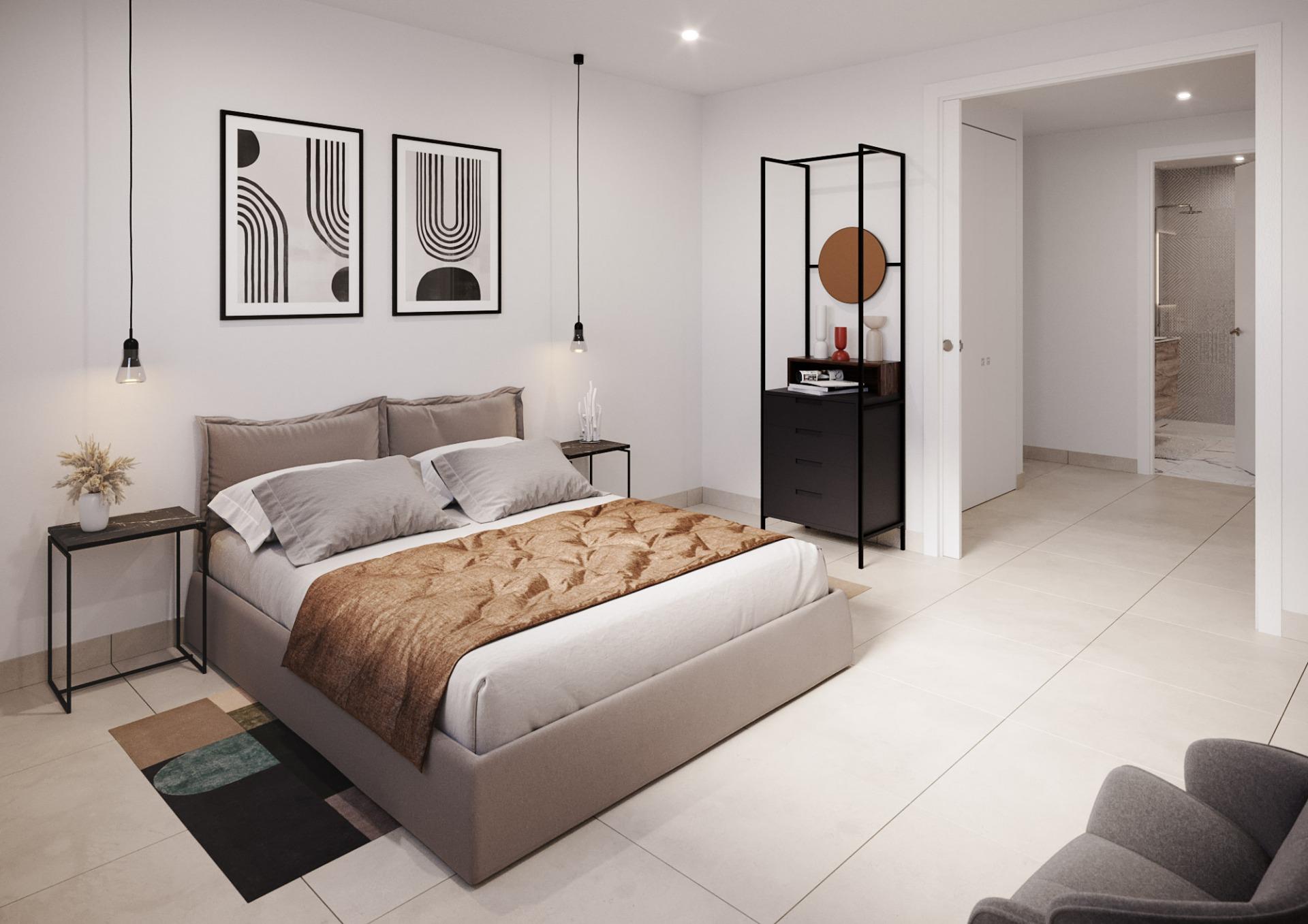 Modern bedroom with a low gray bed, two pendant lights, and two abstract framed prints above the headboard.