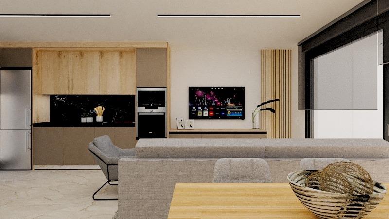 Open-concept living room and kitchen with beige sofa, wood cabinets, stainless fridge, built-in oven, wall TV, and a woven bowl on the dining table.