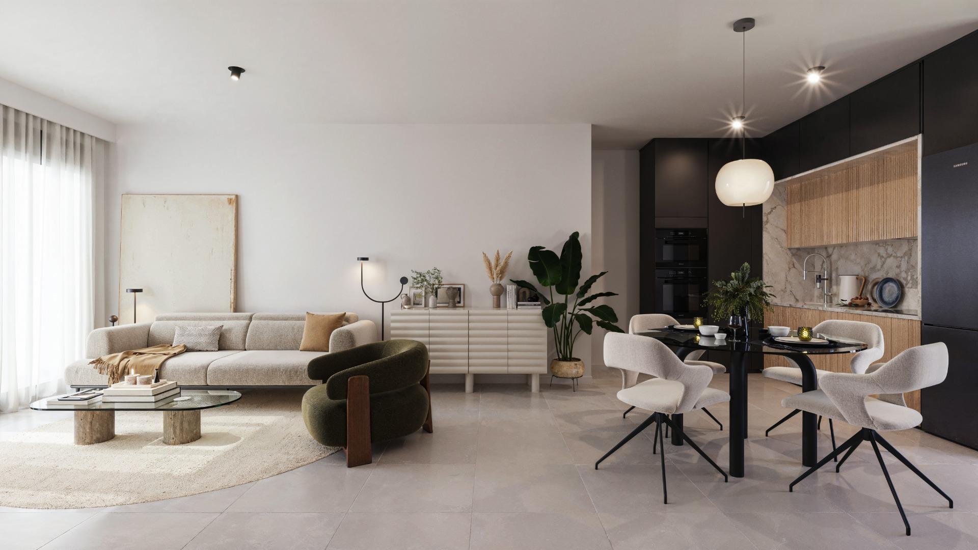 Open-concept living and dining area with a beige sofa, green chairs, and a black round dining table in a modern kitchen space.