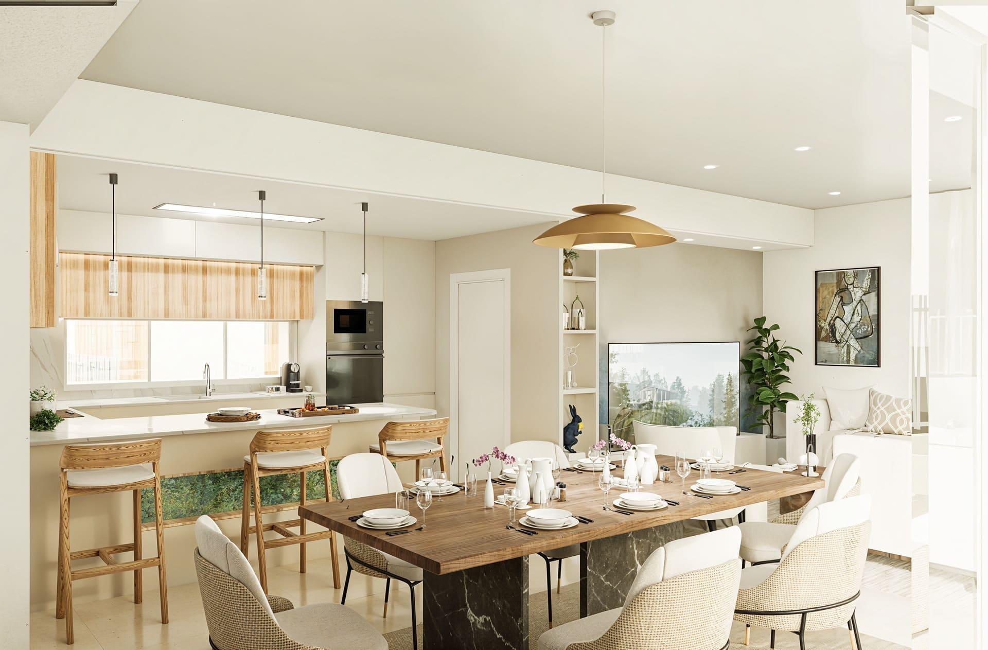 Open-concept kitchen and dining area with a large wooden table set for eight, white cabinetry, and pendant lights over a breakfast bar.
