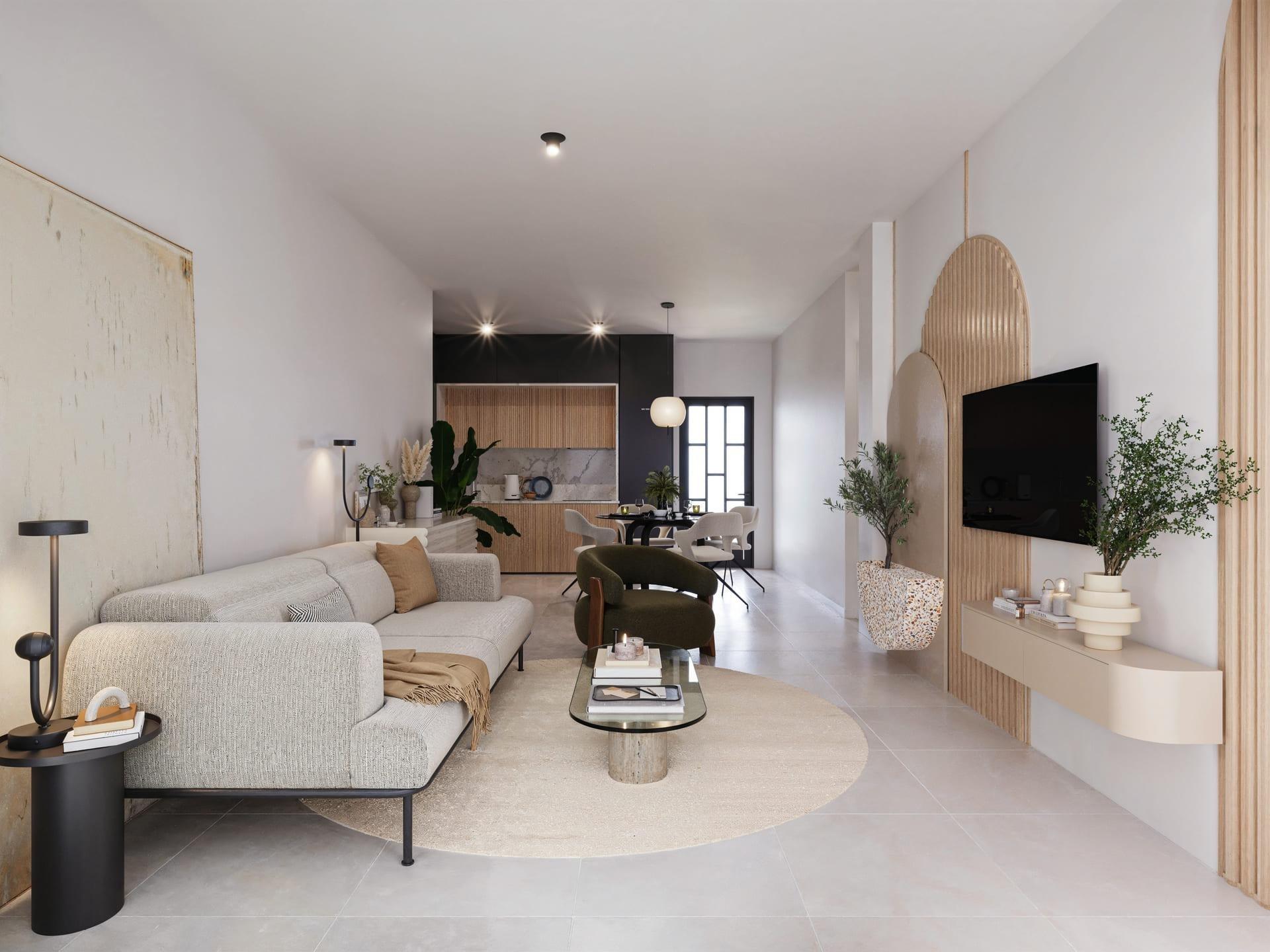Bright open-plan living room with a beige sofa, round glass coffee table, and a tall black floor lamp.