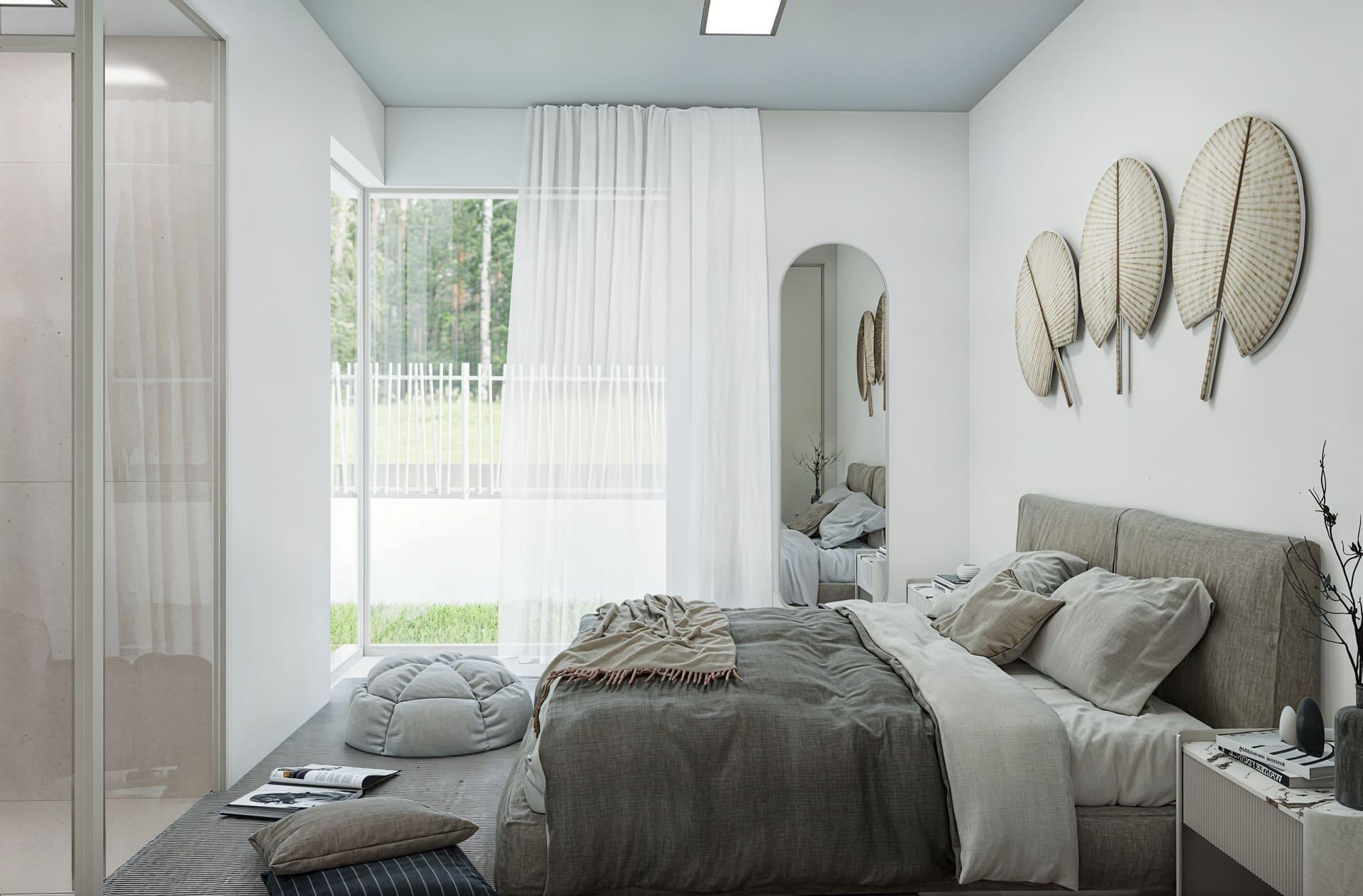 Contemporary bedroom with a low gray bed, sheer white curtains, and round wicker leaf wall art.