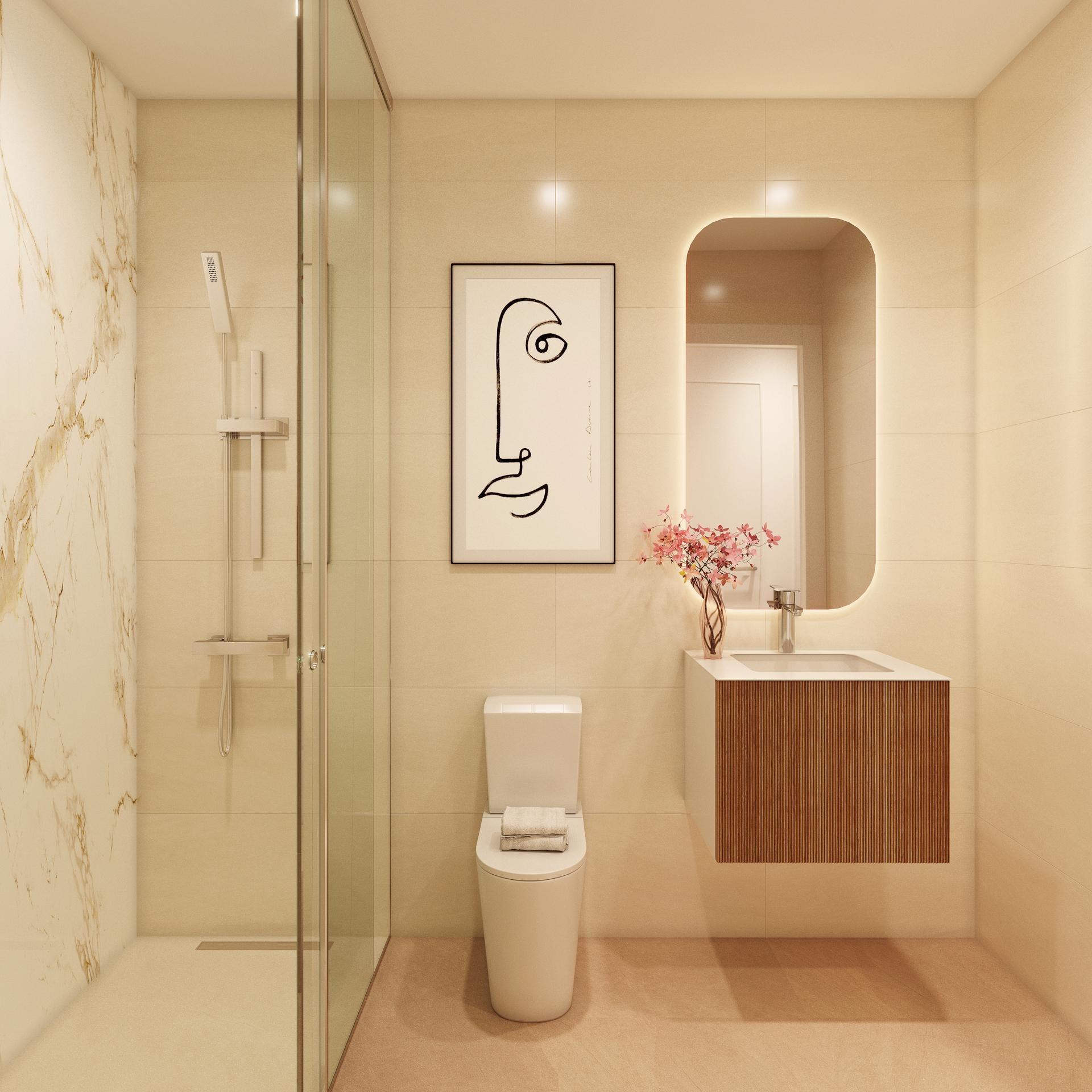 Modern beige bathroom with glass shower, framed abstract art, a wooden vanity, and a white toilet with folded towels on top of the lid used as a decorative touch? (Note: prefer concise alt text)