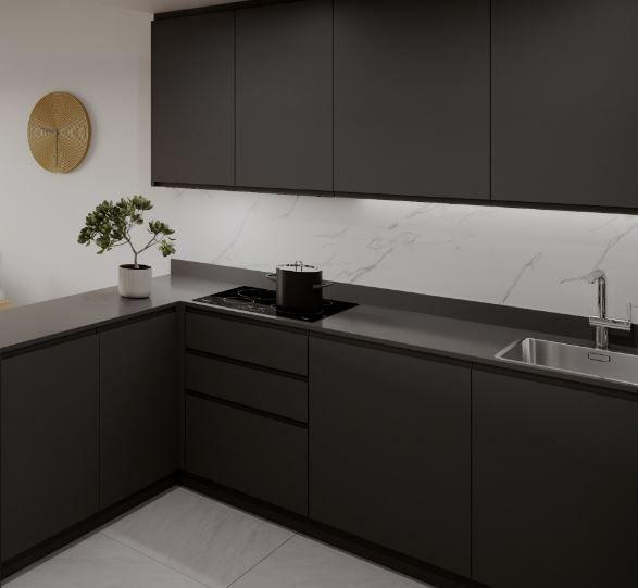 Modern dark-kitchen with black cabinets, white marble backsplash, and a plant on the counter near a stovetop and sink area