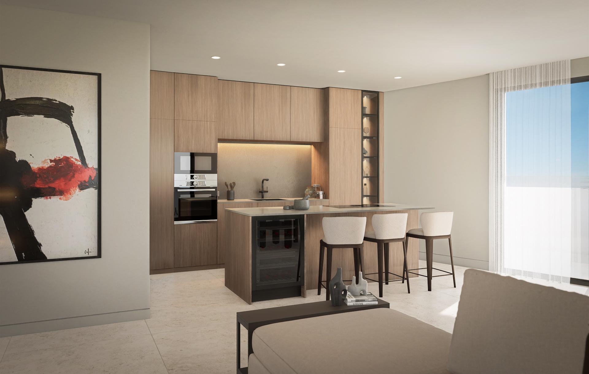 Open-plan kitchen with wooden cabinets, an island, built-in oven, and bar seating near a large window with sheer curtains.
