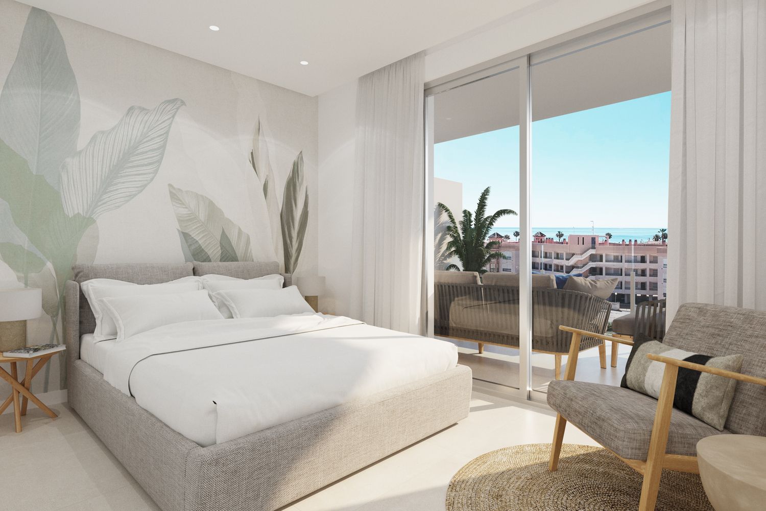 Bright hotel bedroom with a botanical mural, white bedding, and sliding glass doors to a balcony overlooking the ocean.