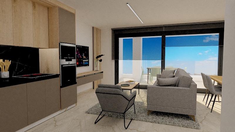 Open-plan living area with beige kitchen cabinets on the left, a seating area in the center, and a glass sliding door opening to a balcony with an ocean view.