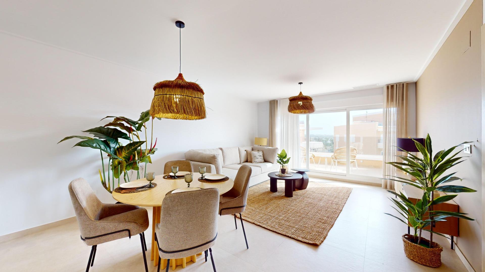 Open-plan living and dining area with a round wooden table, beige chairs, sofa, and glass doors opening to a balcony,”,