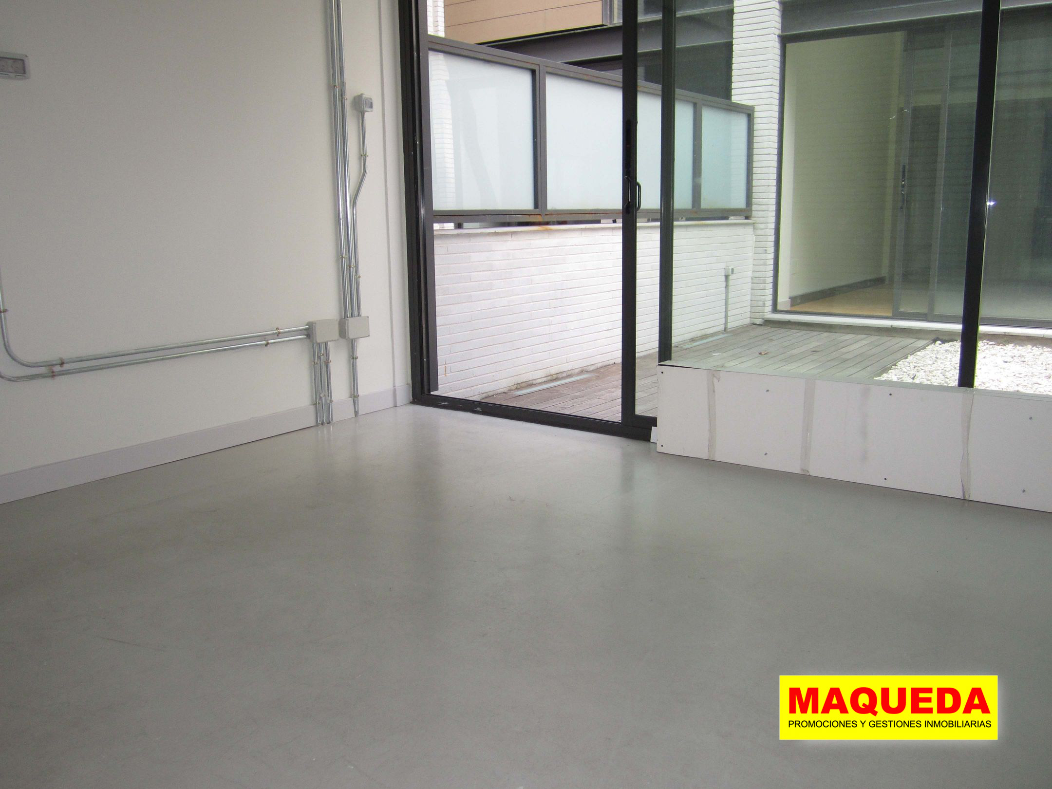Zona de trabajo con jardín del loft en venta en Puerta del Sur